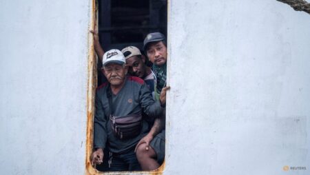 Indonesia recovers three bodies as effort begins to right capsized ship