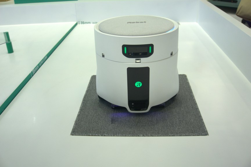I Watched a Floor Washing Robot Mothership Deploy a Roomba Using a Mechnical Arm