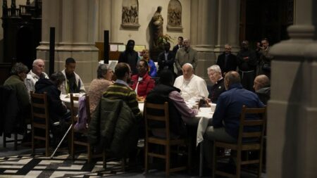 Pope meets homeless and undocumented in Brussels