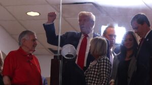 Trump arrives at Alabama-Georgia game to chants of ‘USA,’ ‘Four more years’