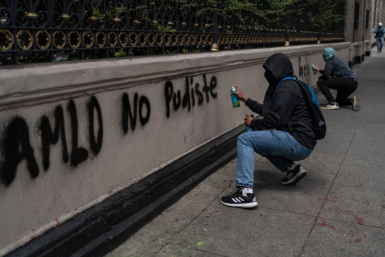 Protestors use graffiti 