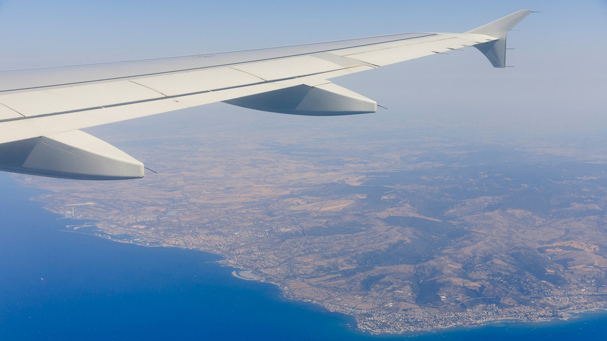 An airplane flying in the sky