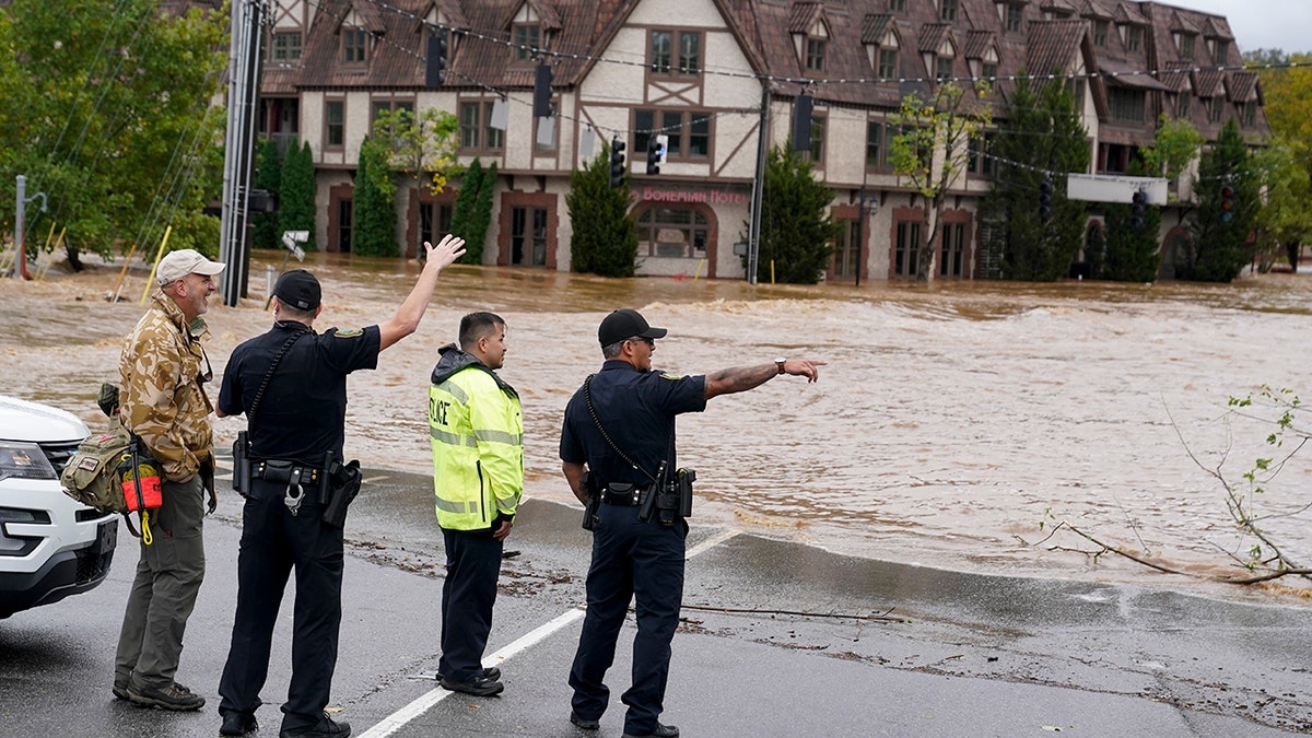 floodwaters rise in Asheville