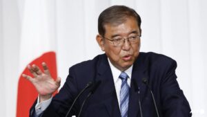 Japan PM vows to stay on despite election debacle