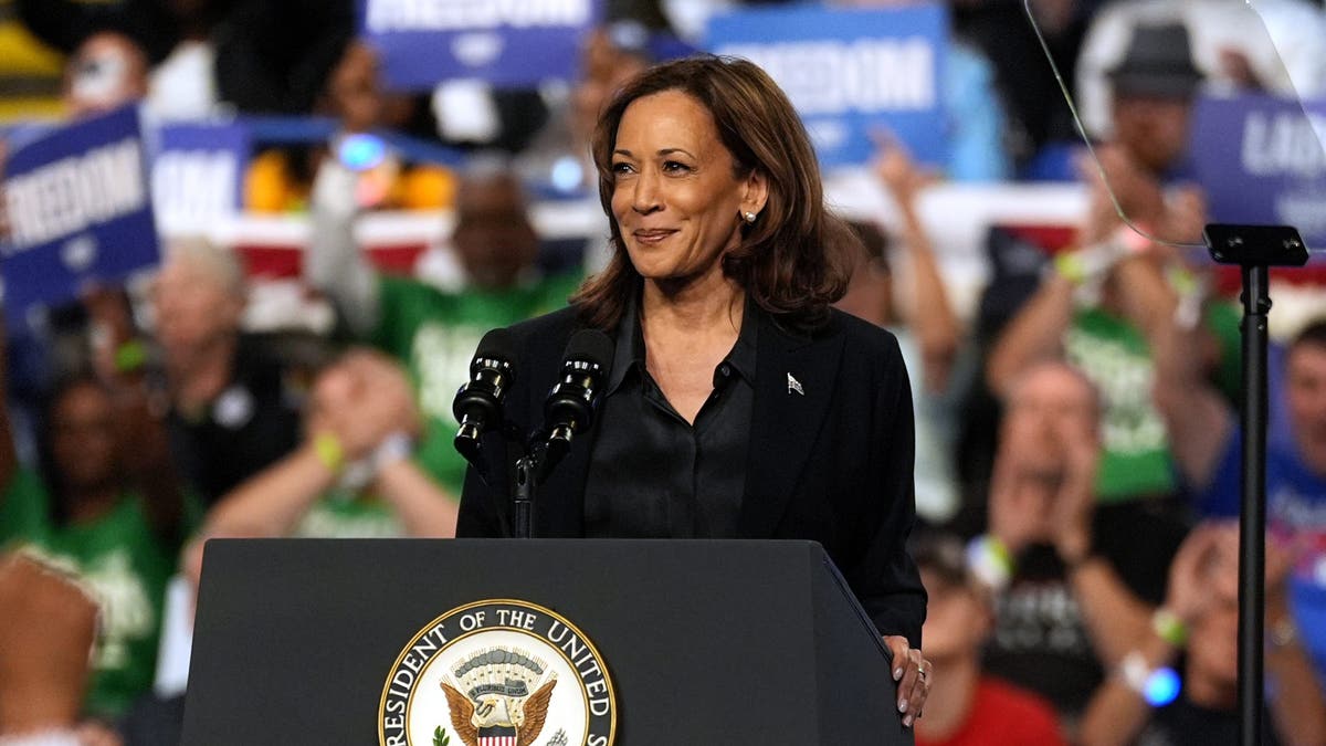 Kamala Harris at lectern at event