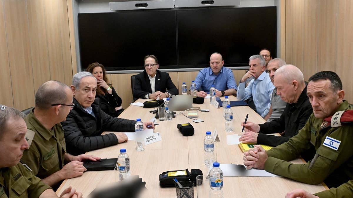 Prime Minister Benjamin Netanyahu conducts a security assessment at the air force HQ in the Kirya base in Tel Aviv, with the minister of defense, the chief of staff, the head of Mossad and the head of Shin Bet.