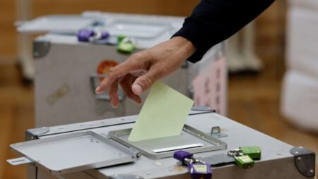 Japan’s ruling coalition set to lose parliamentary majority, exit polls show