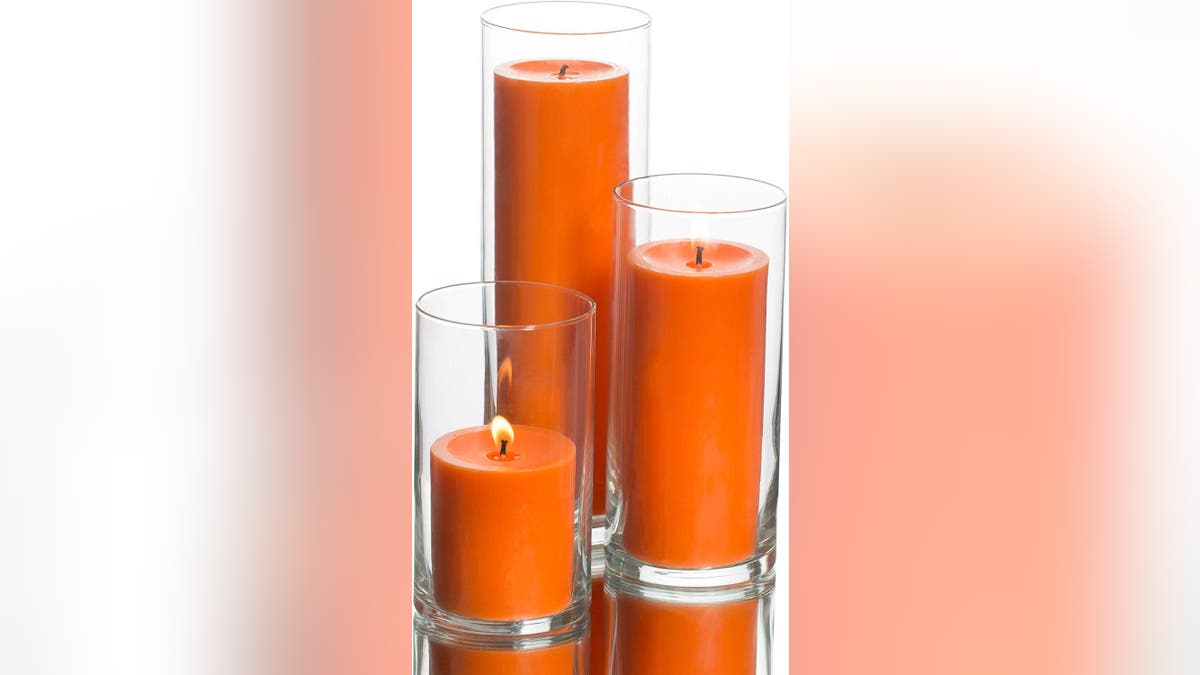 Brighten up your table with pillar candles and glass holders. 