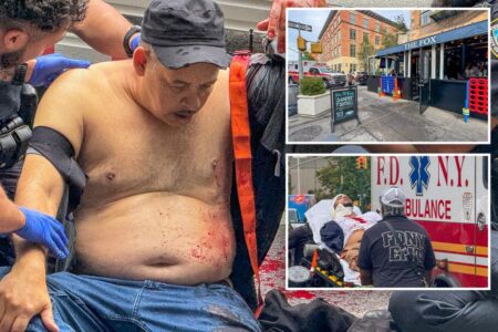 Knife-wielding men left bloodied after duking it out in broad daylight on NYC street: wild video 