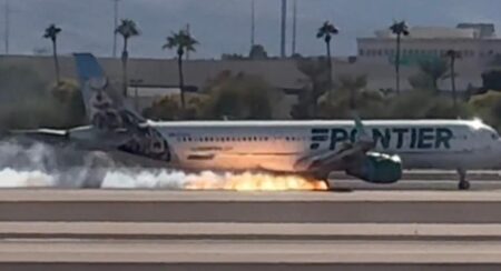 Flames shoot out from Frontier Airlines jet as it landed in Las Vegas