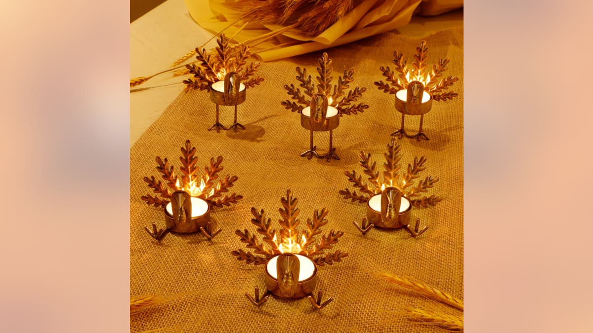 These turkey candleholders are adorable additions to your dinner.