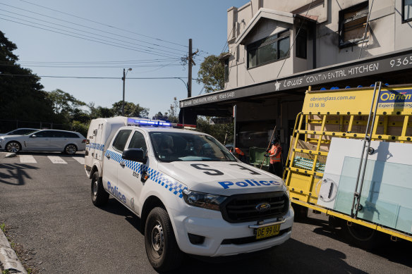 The business remained a crime scene on Sunday afternoon