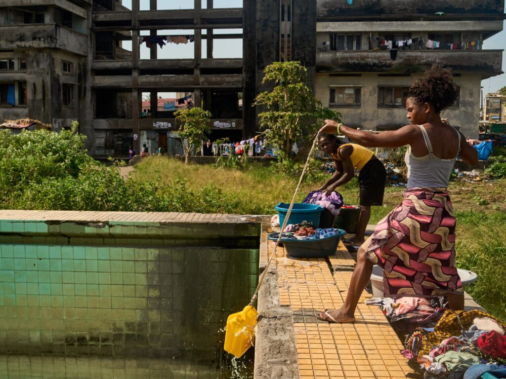 Photos: Mozambique’s faded hotel squatters hope for change after polls