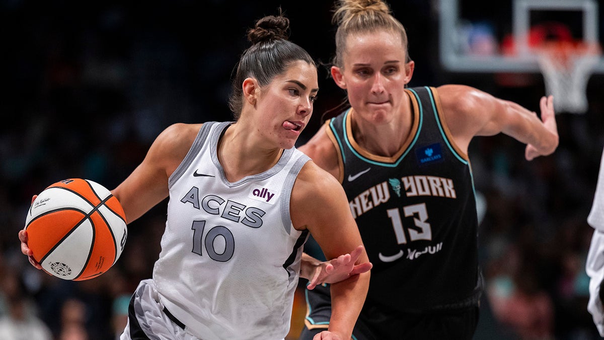 Kelsey Plum drives to the basket