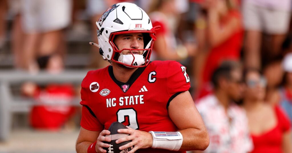 NC State QB Grayson McCall Sustains Hit to the Head, Helmet Knocked Off as He’s Carted Off Field