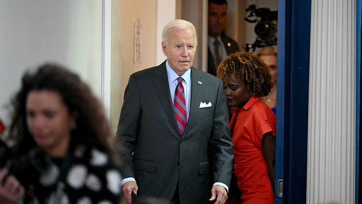 President Biden arrives at White House briefing room