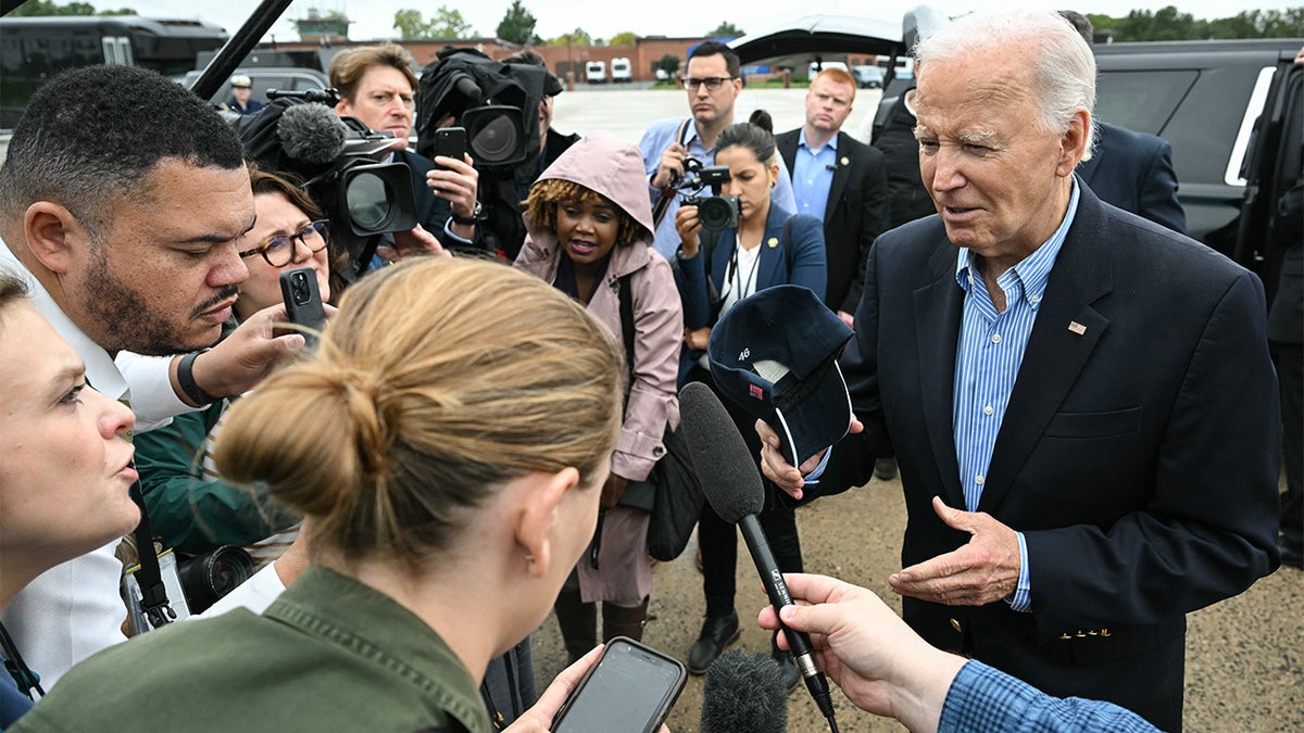 Joe Biden speaks with reporters