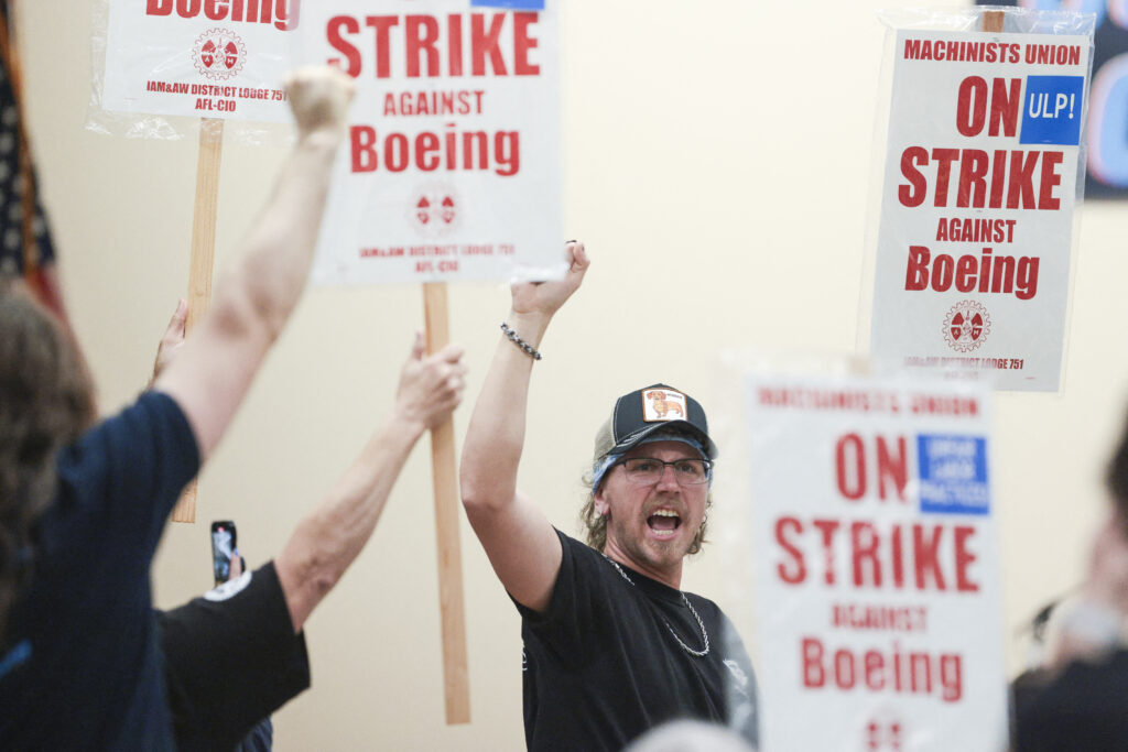 Boeing Faces  Billion Loss as Striking Workers’ Vote Looms