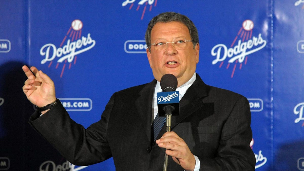 Charley Steiner speaks at a press conference