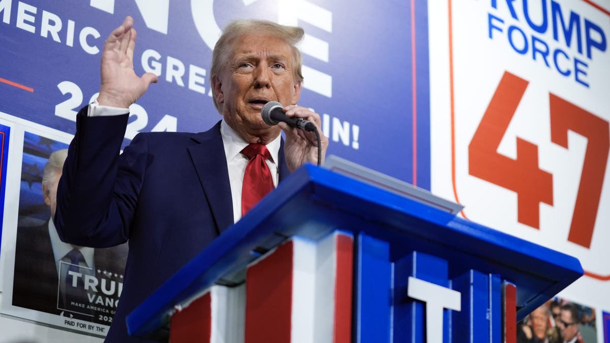 Republican presidential nominee former President Donald Trump speaks as he visits a campaign office, Friday, in Hamtranck, Mich.