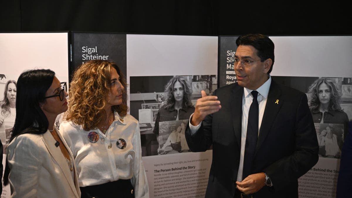 Israeli Ambassador to the U.N. Danny Danon speaks to mothers who lost their children in the Oct. 7 terror attack at the "Eternal Embrace" photo exhibition at United Nations headquarters in New York City on Oct. 7, 2024.