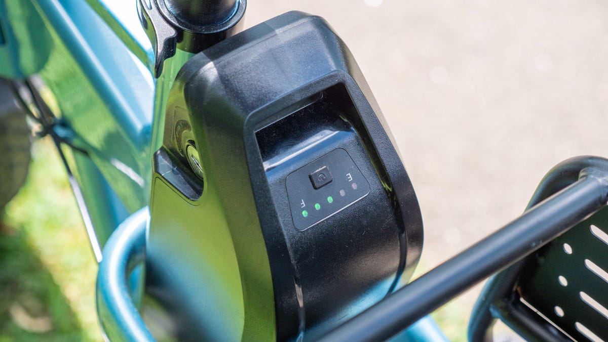 Close up of the Heybike Mars 2.0 e-bike's battery and push-button gauge.