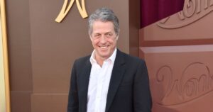 Hugh Grant Got ‘Smashed’ on Tequila Shots With Travis Kelce at Taylor Swift’s ‘Eras Tour’