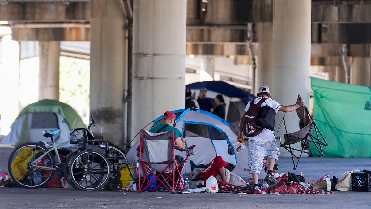 People living in a homeless encampment