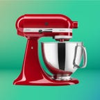 Red KitchenAid stand mixer displayeda against a gradient blue and green background