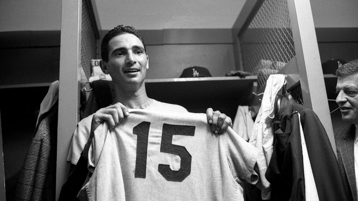 Sandy Koufax celebrates 15 strikeouts