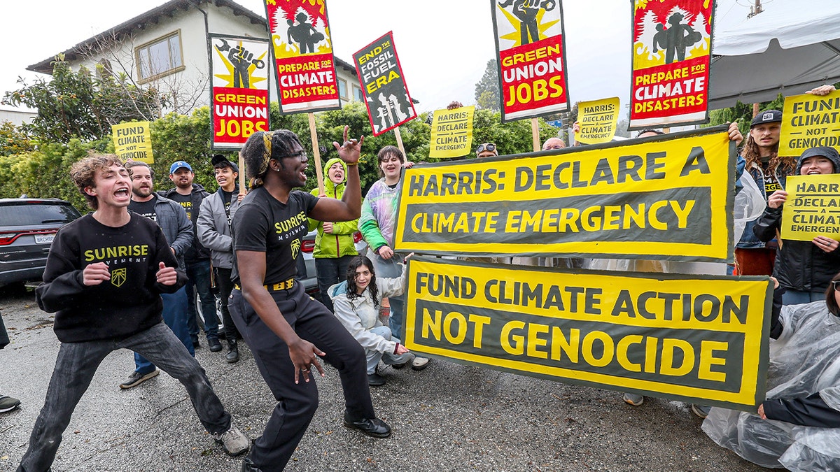 Sunrise Movement protesters gather near Vice President Kamala Harris' Brentwood, California, home, calling on her to urge President Biden to declare a climate emergency on Sunday, April 14, 2024.