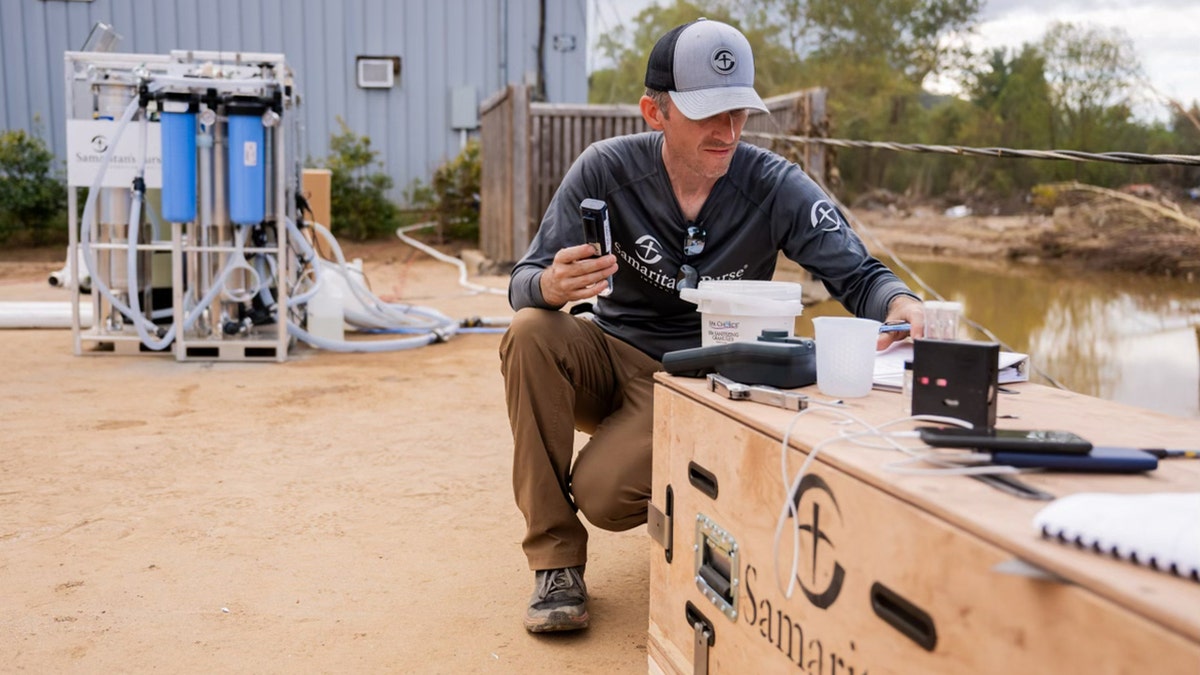 Engineer checking water filtration levels