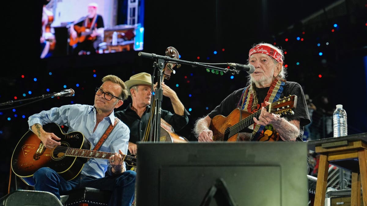 Musician Willie Nelson performing ahead of an event for Democratic presidential nominee Vice President Kamala Harris at a rally in Houston, Friday, Oct. 25, 2024. (AP Photo/Susan Walsh)