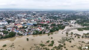 Floods hit northern Philippines after typhoon forces dam release