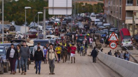 Clean-up volunteers in Spain begin to leave flood-hit areas