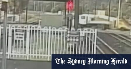 Moment truck crashes into train powerlines, sparking major delays