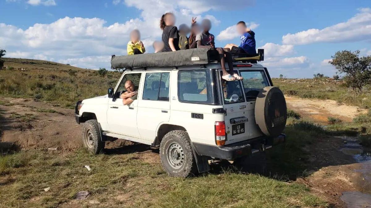 beau shroyer in a SUV with children