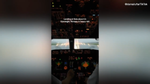 Flight attendant’s viral video shows pilots landing in heavy rainstorm