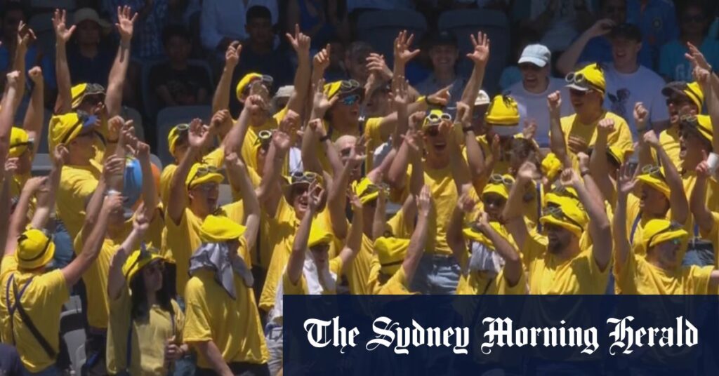 Big cheer goes up as Aussies reach 100