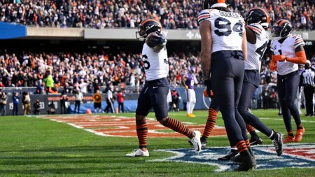 Simone Biles’ husband, Jonathan Owens, mimics wife’s gymnast pose for fumble recovery celebration