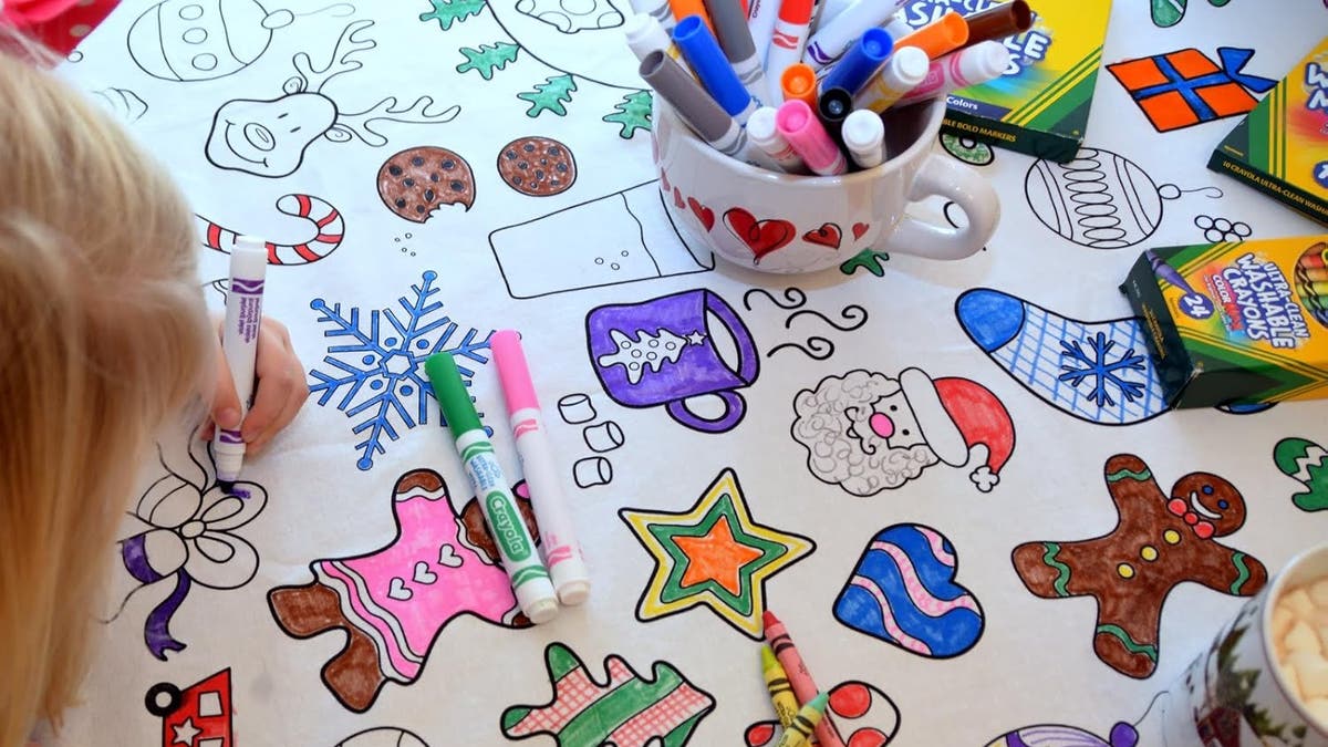 Give the kids something to do at the table with a coloring tablecloth. 