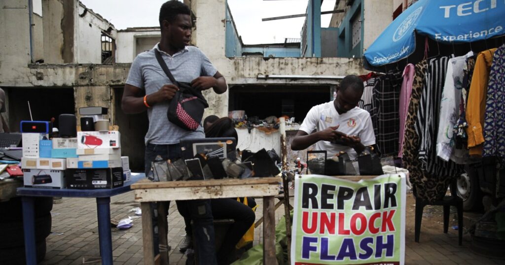 Want status in Nigeria? An informal iPhone market offers dreams and despair