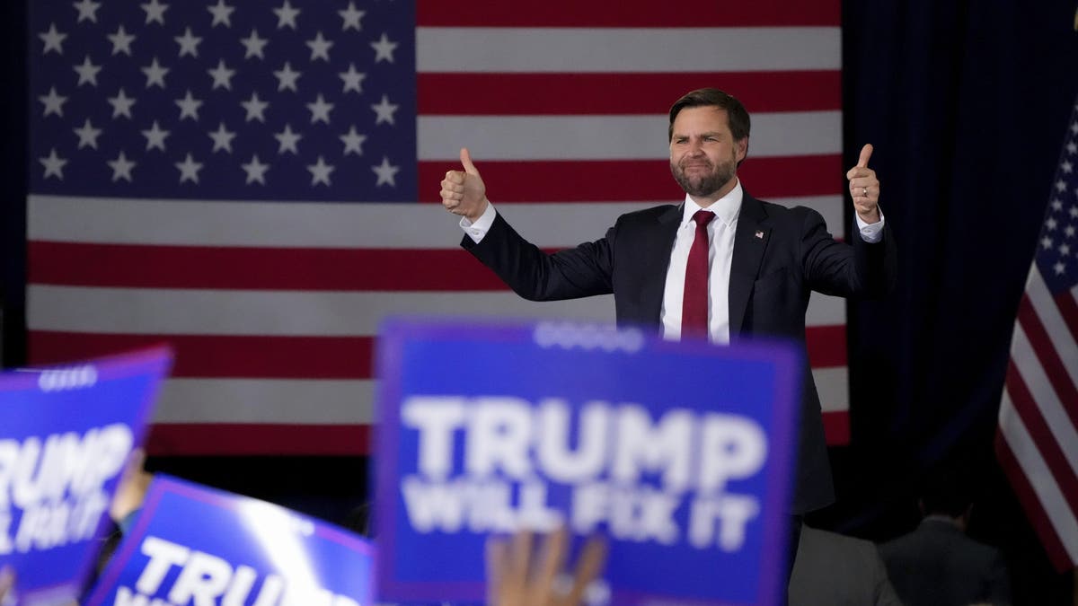 Republican vice presidential nominee Sen. JD Vance, R-Ohio, gestures to the crowd after speaking during a campaign rally on Monday, Nov. 4, 2024, in Newtown, Pa.