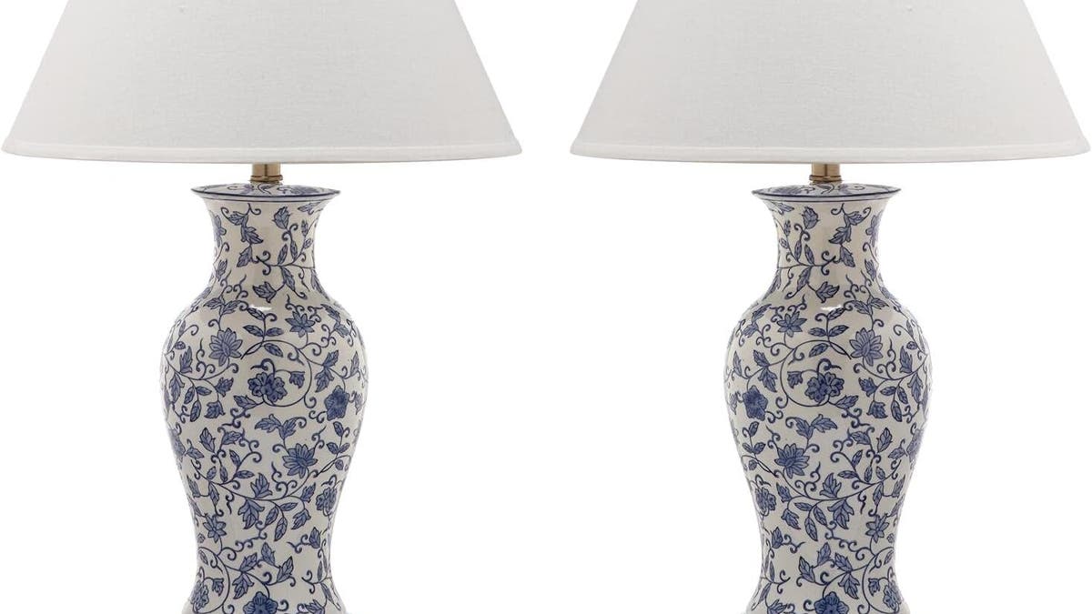 This set of two beautiful table lamps from Safavieh feature a blue and white design of wandering flowers and vines.