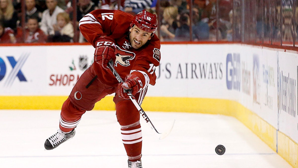 Paul Bissonnette passes the puck