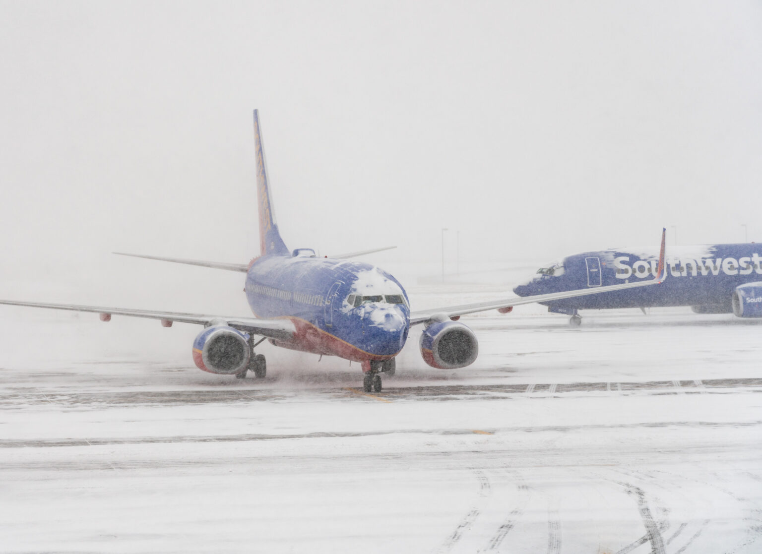 More Than 50 Flights Canceled and 1,400 Delayed As Winter Storms Hit U.S.