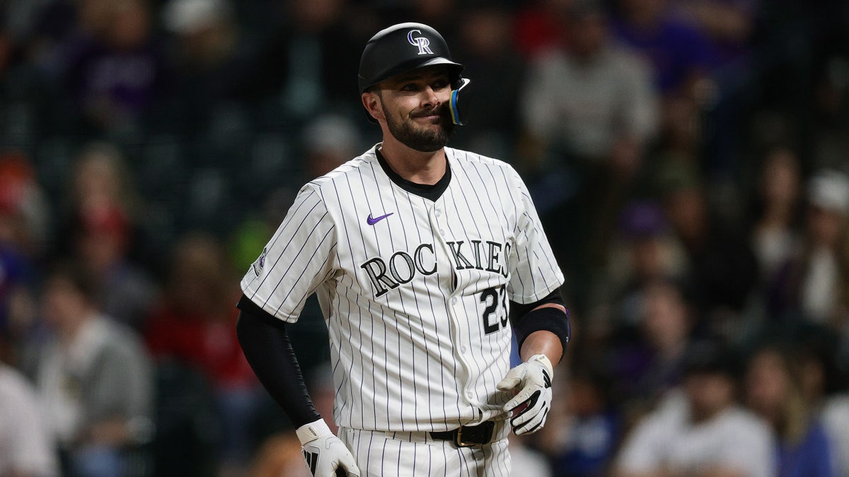 Colorado Rockies designated hitter Kris Bryant reacts after a pitch in the 10th inning against the Philadelphia Phillies at Coors Field.