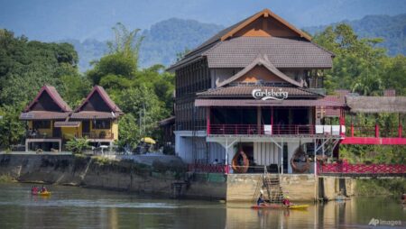 New Zealand citizen poisoned by tainted alcohol in Laos returns home