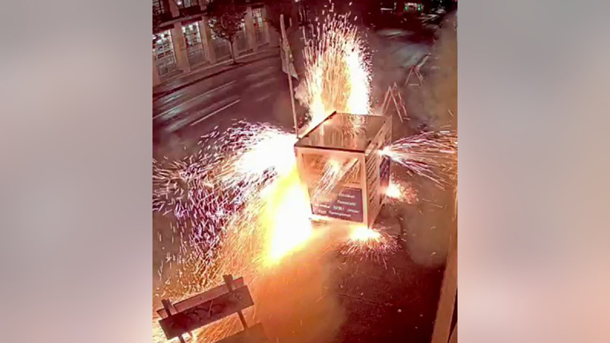 fire erupting inside ballot drop box