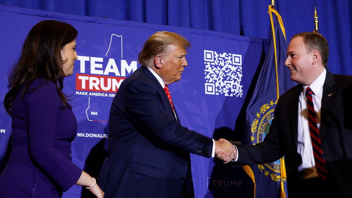 Rep. Elise Stefanik (R-NY) (L) and Rep. Lee Zeldin (R-NY) (R) join Donald Trump during a campaign rally at the Grappone Convention Center on Jan. 19, 2024 in Concord, New Hampshire.